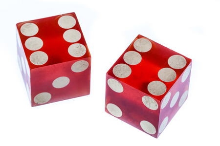 two red clear plastic dices isolated over whiteの写真素材