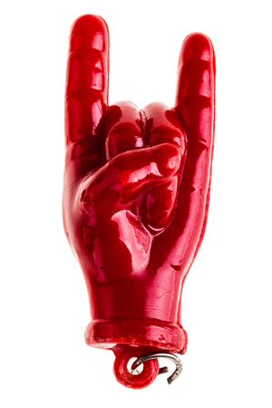 a small horns handsign talisman isolated over a white backgroundの写真素材