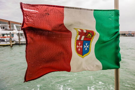 Italian Nautical Flag closeup, in venice, italy.の写真素材