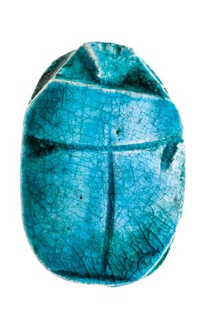 an egyptian scarab talisman isolated over a pure white backgroundの写真素材