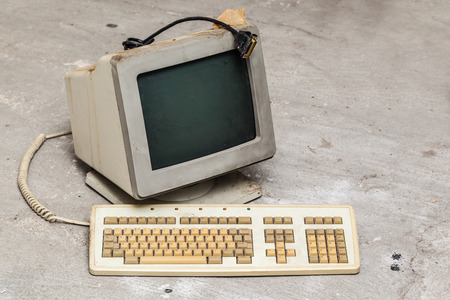some old and obsolete pc and keyboards dumped in the street