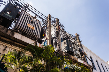 a old electric transformer in a street of bangkok, thailand