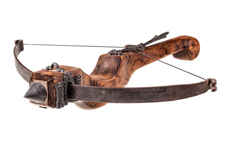 an ancient medieval crossbow isolated over a white backgroundの写真素材
