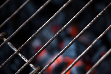 burning coal in a barbecueの写真素材
