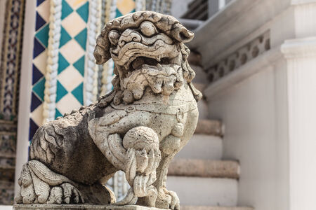 Chinese dog or lion sculpture in Wat Phra Kaew, Temple of the Emerald Buddha, Bangkok, Thailand.のeditorial素材
