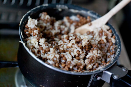 Rice and lentils in a dirty kitchenの写真素材