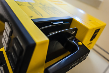Manual external defibrillators are used in conjunction with electrocardiogram readers, which are used to diagnose a cardiac conditionの写真素材