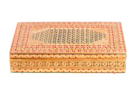 a beautiful bulgarian wooden inlaid box isolated over a white backgroundの写真素材