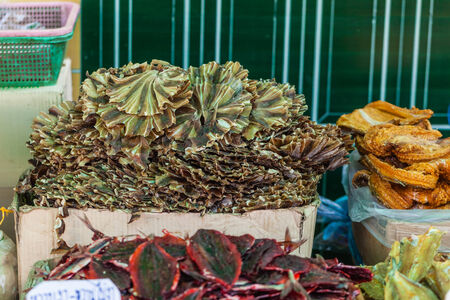 dried seafood on sale in a thai street market in Bangkok, Thailandの写真素材