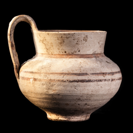 Daunian pot, Terracotta, Subgeometric style isolated over a black backgroundの写真素材