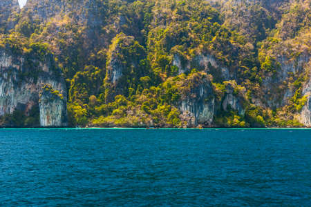 The majestic cliffs of Phi Phi Island tropical paradise, Thailand, in the summerの写真素材