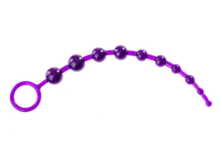 purple rubber anal beads isolated over a white backgroundの写真素材