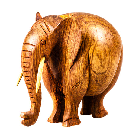 a small wooden elephant isolated over a white backgroundの写真素材