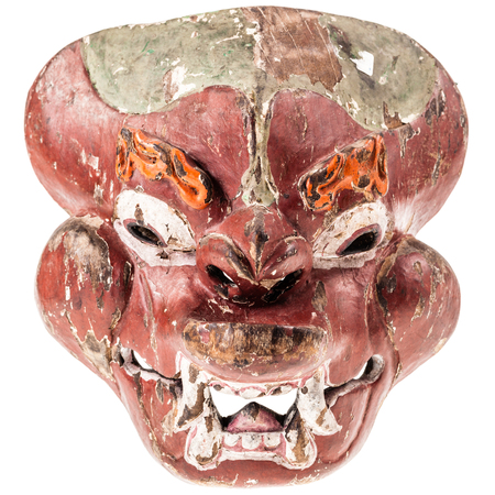 an ancient malaysian mask isolated over a white backgroundの写真素材