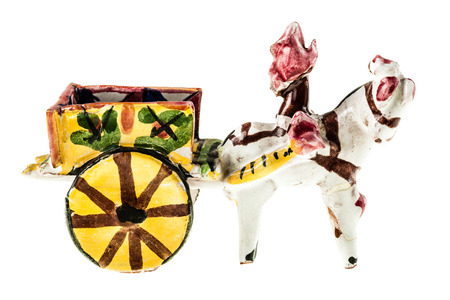 Folkloristic  traditional sicilian horse cart isolated over a white backgroundの写真素材