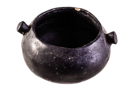 Apulian black pottery ancient canosan bowl isolated over a white backgroundの写真素材