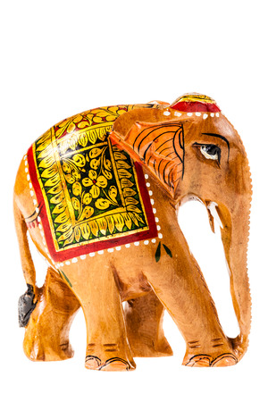 a small wooden elephant isolated over a white backgroundの写真素材