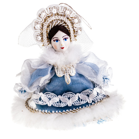 a beautiful vintage doll isolated over a white backgroundの写真素材
