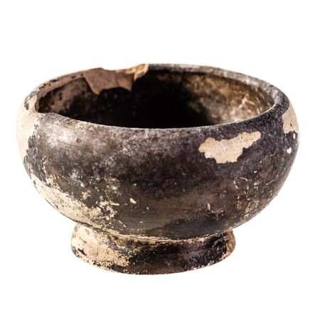 Apulian black pottery ancient canosan bowl isolated over a white backgroundの写真素材
