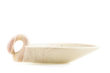 a white stone tray or cup isolated over a white backgroundの写真素材