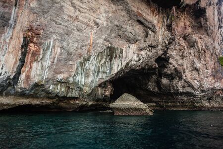 majestic rock formation in phi phi island, in the andaman sea, Thailandの写真素材