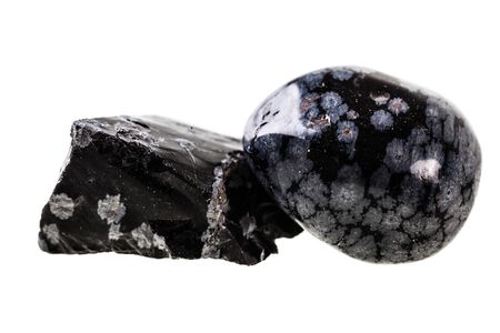 close up shot of a fragment of obsidian mineral isolated on a white backgroundの写真素材