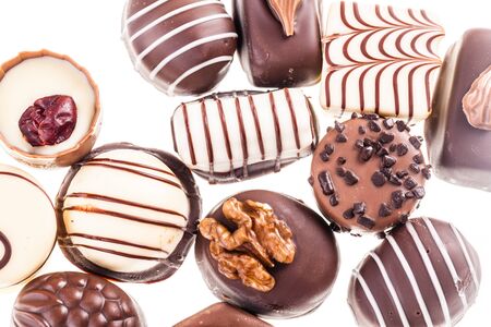 Delicious chocolate pralines isolated over a white backgroundの写真素材