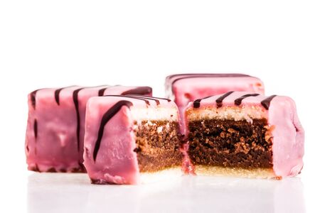 Delicious pink austrian punch cakes isolated over a white backgroundの写真素材