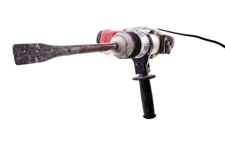 a dirty professional demolisher rotary hammer isolated over a white backgroundの写真素材