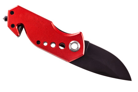 a red pocket utility knife with glass breaker and seatbelt cutter isolated over a white background