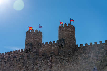 View of Castle External Wall with Two Towers and Multiple Flagsのeditorial素材