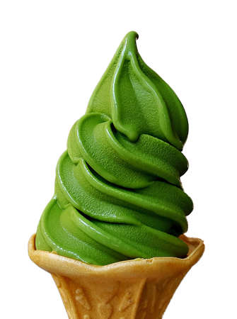 Isolated on white of green tea ice cream in a cone.の写真素材