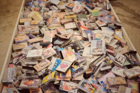 Bangkok, Thailand - JUNE 16, 2018 : Retro cassette tape from 80s front white background, Shop at JJ Green Market, the popular night shopping next to Chatuchak market, Vintage style, old technologyのeditorial素材