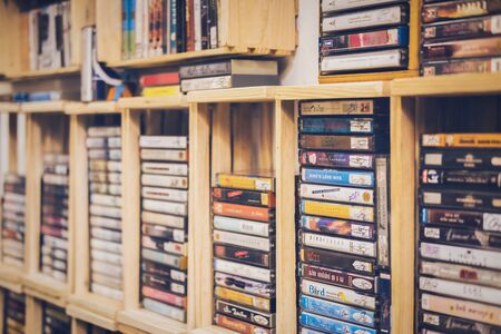 Bangkok, Thailand - JUNE 16, 2018 : Retro cassette tape from 80s front white background, Shop at JJ Green Market, the popular night shopping next to Chatuchak market, Vintage style, old technologyのeditorial素材