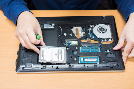 Technician support upgrade part and fixing laptop. select focus, Computer repair concept.
