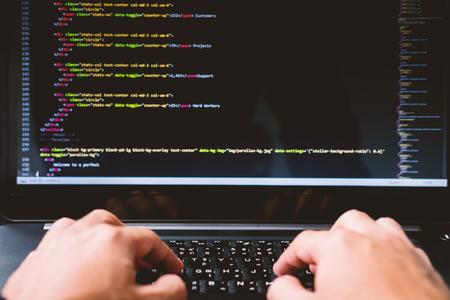 Developing programming and coding technologies on desk white blurry screen, Website design,...