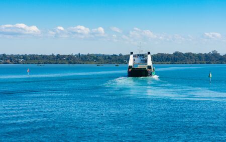 A Car Ferry moving through the waterの写真素材