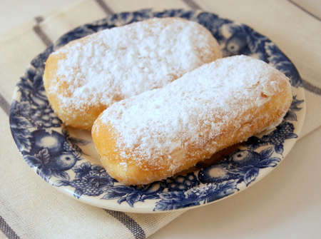 Sweet rolls for breakfast on a blue and white plate