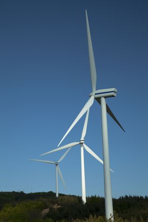 Wind turbines. A wind farm is a group of wind turbines used to generate electricity.の写真素材