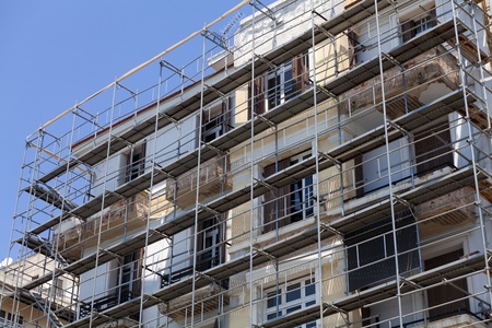 Renovation of old houses with scaffoldingの写真素材