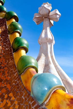 Roof architecture at Casa Batllo. Building restored by Antoni Gaudi and Josep Maria Jujol. Complex chimney detailing of the roof is arched and was likened to the back of a dragon or dinosaur.のeditorial素材