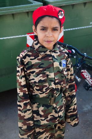 ALEXANDROUPOLIS, GREECE - FEB 25: Unidentified participant of carnival parade in Alexandroupolis on February 25, 2012 in Alexandroupolis, Greece. Little boy dressed soldier.のeditorial素材