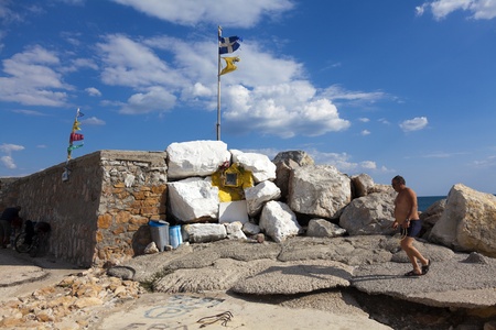 ALEXANDROUPOLI, GREECE - AUGUST 13: Old shrine of stones in the port of city built to guard the mariners on August 13, 2012 in Alexandroupoli, Greeceのeditorial素材