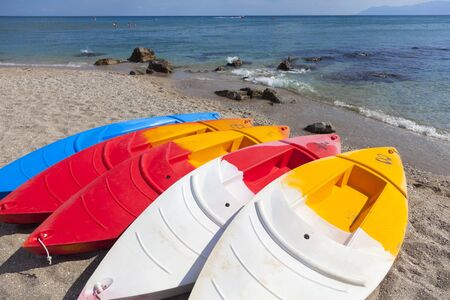 Multi-color canoes (kayaks) on ''kiani akti'' beach in Alexandroupoli - Greeceの写真素材