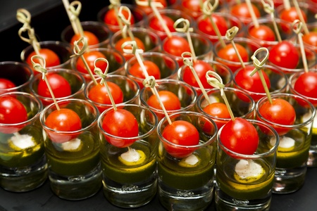 Canape food is a small, prepared and usually decorative food, held in the fingers and often eaten in one bite.の写真素材