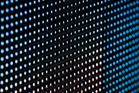 RGB led diode display panel with blue diodes turned on. Selective focus. Shallow depth of field.の写真素材