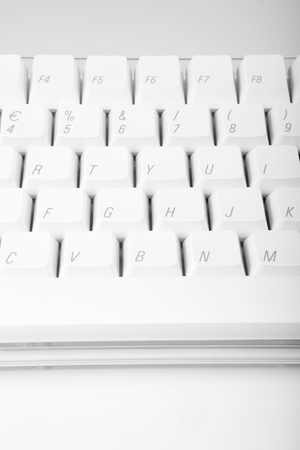 White computer keyboard on white backgroundの写真素材