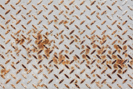 Background of old metal diamond plate in grey color