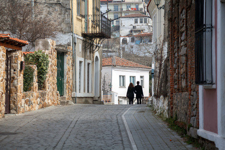 XANTHI, GREECE - FEB 22, 2015: Couple walking in the beautiful old city of Xanthi, Greeceのeditorial素材