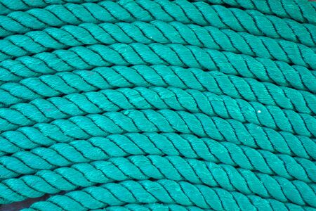Thick rope on a wooden sailing ship floorの写真素材